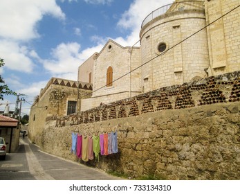 The wall and buildings of the monastery of St. Nicodemus and St. Joseph of Arimathea in Ramla (Israel)