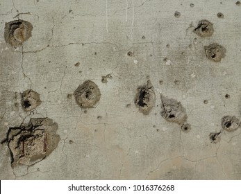 Wall With Bullet Holes