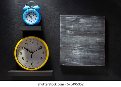 wall clock at black background texture