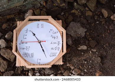 wall clock with mathematical formulas. Unique wall clock made from ice cream sticks 