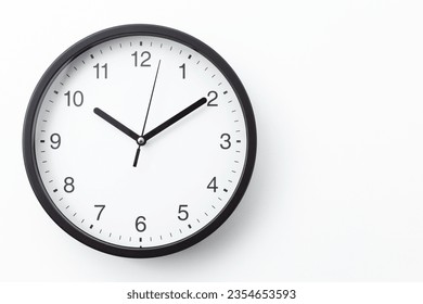 Wall clock on white background. - Shutterstock ID 2354653593