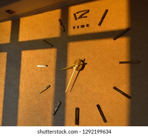wall clock at sunset