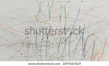 Wall Covered in Crayon Marks Made by a Small Child in the Bedroom