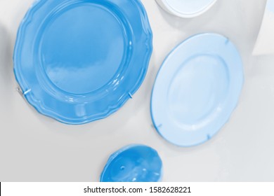 Wall Decor, Blue Plates On White Wall.  Color Of The Year 2020 Pantone Classic Blue