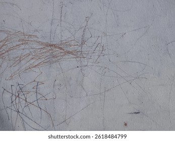 A wall filled with random scribbles made using colored pencils or crayons, likely from children’s activities