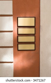 Wall With Four Copper Nameplate