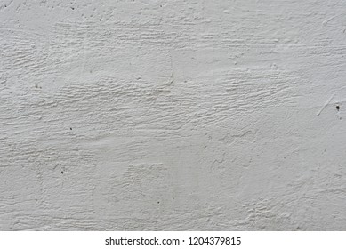 Wall fragment with scratches and cracks. It can be used as a background - Shutterstock ID 1204379815