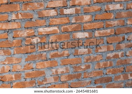 wall of hand made bricks and morter with texture and no background