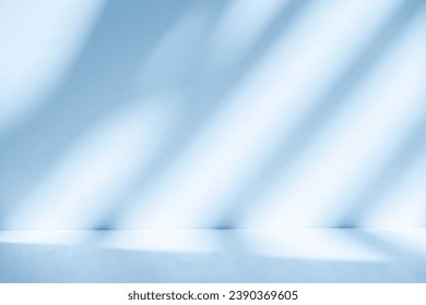 Wall interior background, studio  and backdrops show products.with shadow from window color white and blue light. background for text insertion and presentation product 