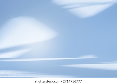 Wall interior background, studio  and backdrops show products. with leaf shadow from window color blue tone. background for text insertion and presentation of product