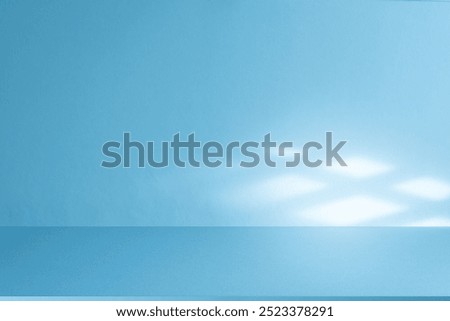 Wall interior background, studio  and backdrops show products.with shadow from window color white and blue light. background for text insertion and presentation product 