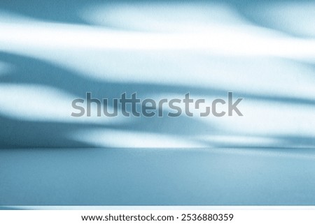 Wall interior background, studio  and backdrops show products.with shadow from window color white and blue light. background for text insertion and presentation product 