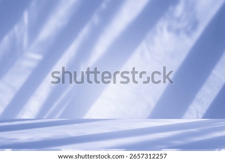 Wall interior background, studio  and backdrops show products.with shadow from window color white and blue light. background for text insertion and presentation product 