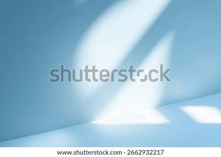 Wall interior background, studio  and backdrops show products.with shadow from window color white and blue light. background for text insertion and presentation product 