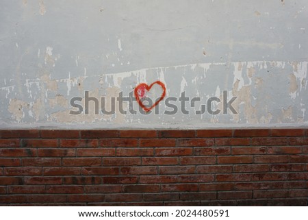 Similar – red heart sprayed on the house