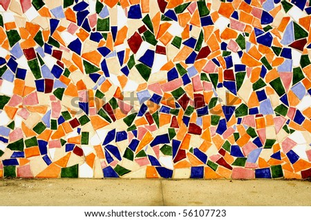 a wall made with an abstract pattern made with mosaic bits