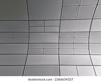
It is a wall made of metal plates. - Shutterstock ID 2366654337