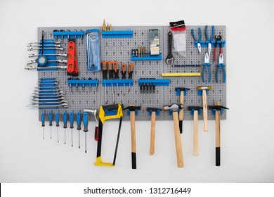 Wall With Many Tools In Workshop