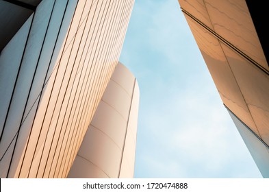 wall of a modern building on a background of blue sky abstract architectural background - Powered by Shutterstock