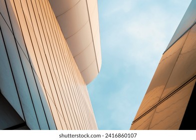 wall of a modern building on a background of blue sky abstract architectural background - Powered by Shutterstock