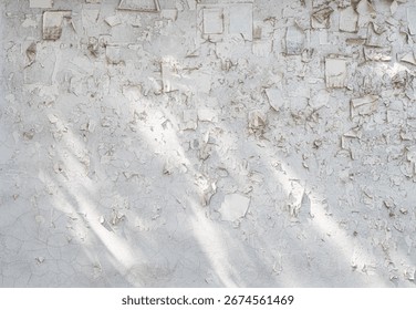 Wall with old paper advertisements. Old empty concrete