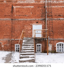 The wall of old red brick building and two stairs front view
 - Powered by Shutterstock