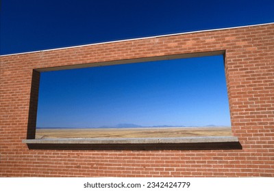 Wall with an opening at Meteor Crater National Landmark Winslow AZ, USA. At this spot the Apollo astronauts have been trained for their missions - Powered by Shutterstock