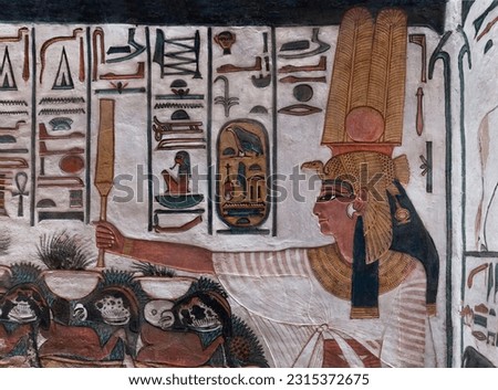 Wall Painting Reliefs shows queen Nefertari in her tomb. Valley of Queens .Luxor .Egypt.