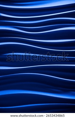 Wall panel of blue wavey curvy lines