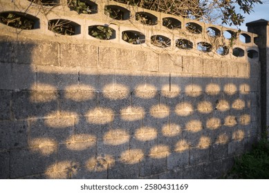 Wall pattern shadow on concrete wall