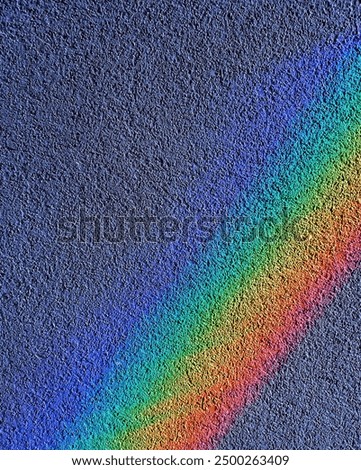 Wall and rainbow on window 