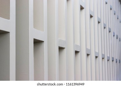The wall Rectangular passages. lines lead the eye. background blurred