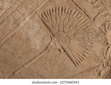 wall relief figure an ancient Egyptian hand fan i with feather at Karnak Temple . Luxor. Egypt . - Shutterstock ID 2273460341