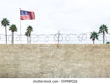 Wall With Secure Barbed Wire Fence Along The Southern Border Of The United States