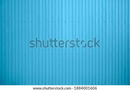 Wall of sheet metal, corrugated metal. Background. blue Corrugated metal texture surface or galvanize steel background