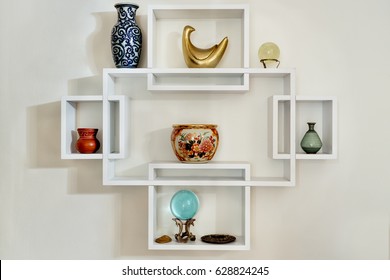 Wall Shelves With Various Items