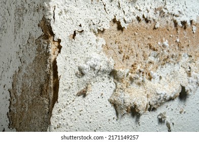 Wall Showing Peeling And Bubbling Paint Due To Water Leak In The Wall, Paint Damage Caused By Moisture In The Walls