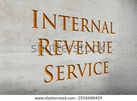 A wall signage that says 'Internal Revenue Service'.