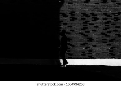 a wall and some shadows, bricks