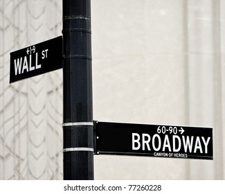 Wall St And Broadway Street Sign In NYC