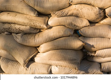 Wall Of Stacked Sandbags For Flood Control.