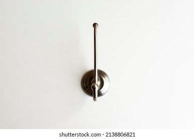 Wall stainless steel hook on white background isolated