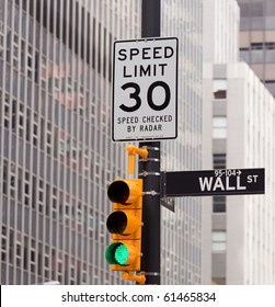 Wall Street Road Sign In The Corner Of New York Stock Exchange, Manhattan An Icon Of Global Investment, Finance, Trading