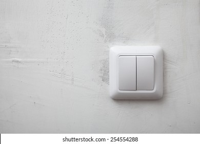 Wall Switch On The White Wall