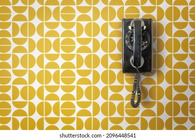 wall telephone hanging on vintage mid century modern wall paper - Shutterstock ID 2096448541