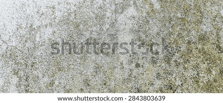 Wall texture background with rustic plaster, grimy details, and distressed surfaces creating an old weathered appearance.