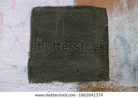 wall texture with black square in the center