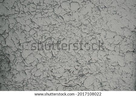 Wall texture with peeling paint. Close up 