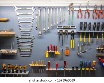 A wall of tools in a workshop