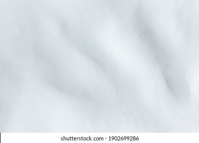 Wall with white curved plaster. Poorly done work on plastering the wall. - Shutterstock ID 1902699286